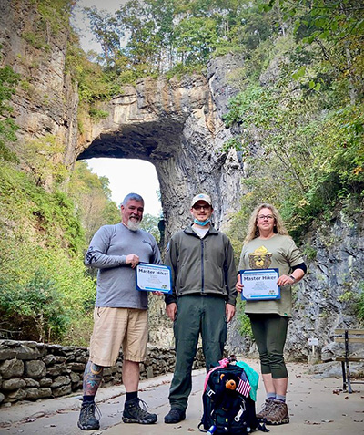 RJ Meade and Debra Ryder receiving their Master Hiker certificates at Natural Bridge photo by Debra Ryder