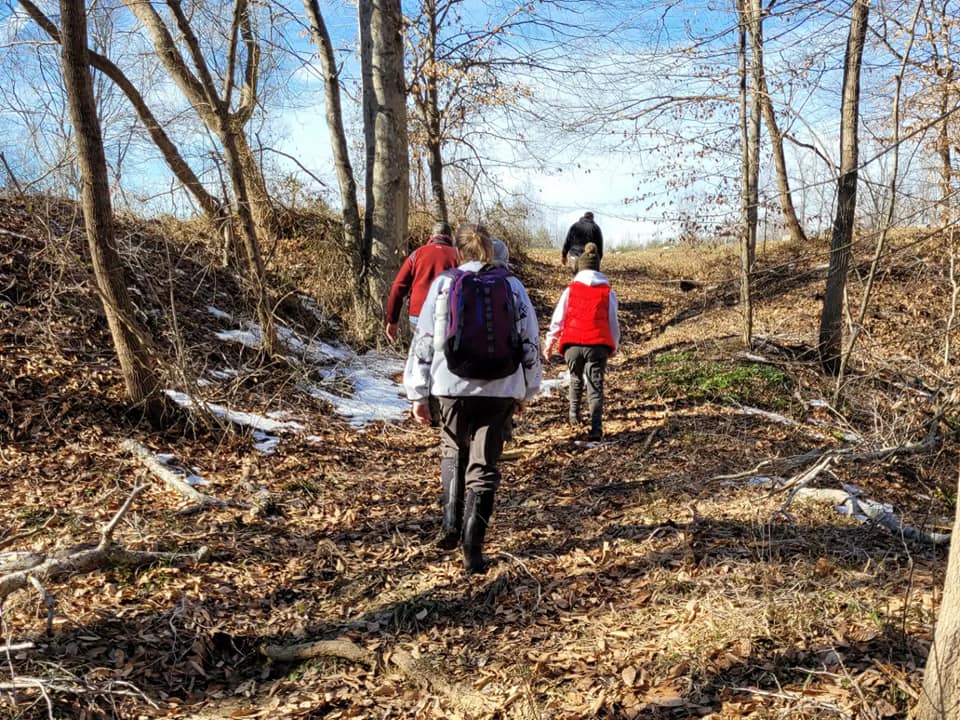 group hiking on the trail at Crow's Nest Natural Area Preserve