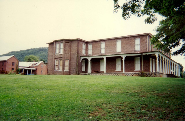 The boarded-up hotel before any restoration was done.