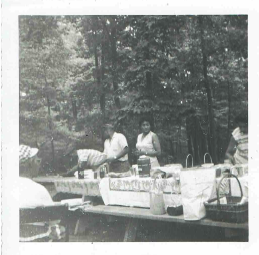 Family enjoying a picnic at Green Pastures Recreation Area.