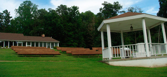 Nestled in the woods, Cedar Crest overlooks a picturesque lake.